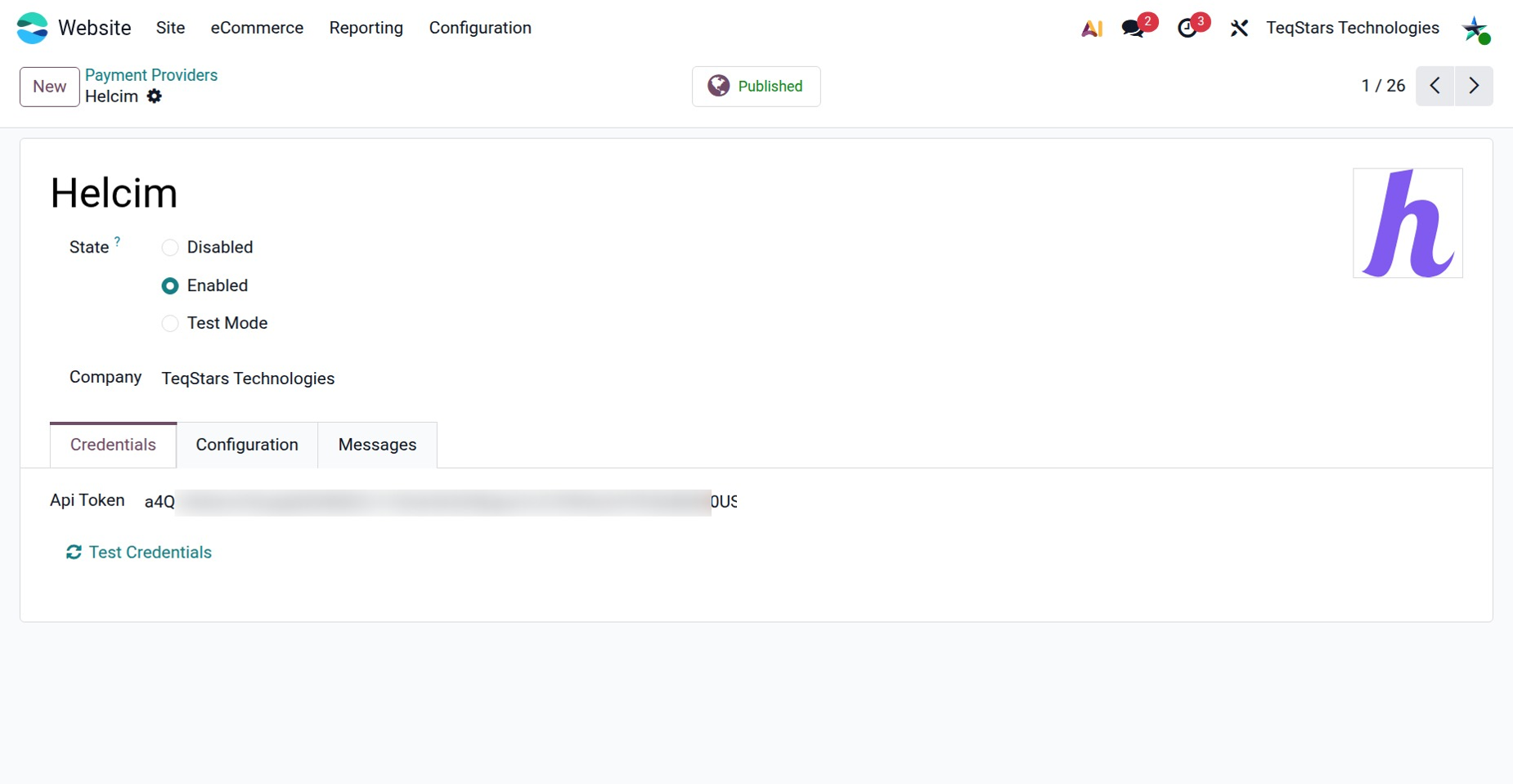 the Helcim payment provider form in Odoo with the Api Token field and the Test Credentials note